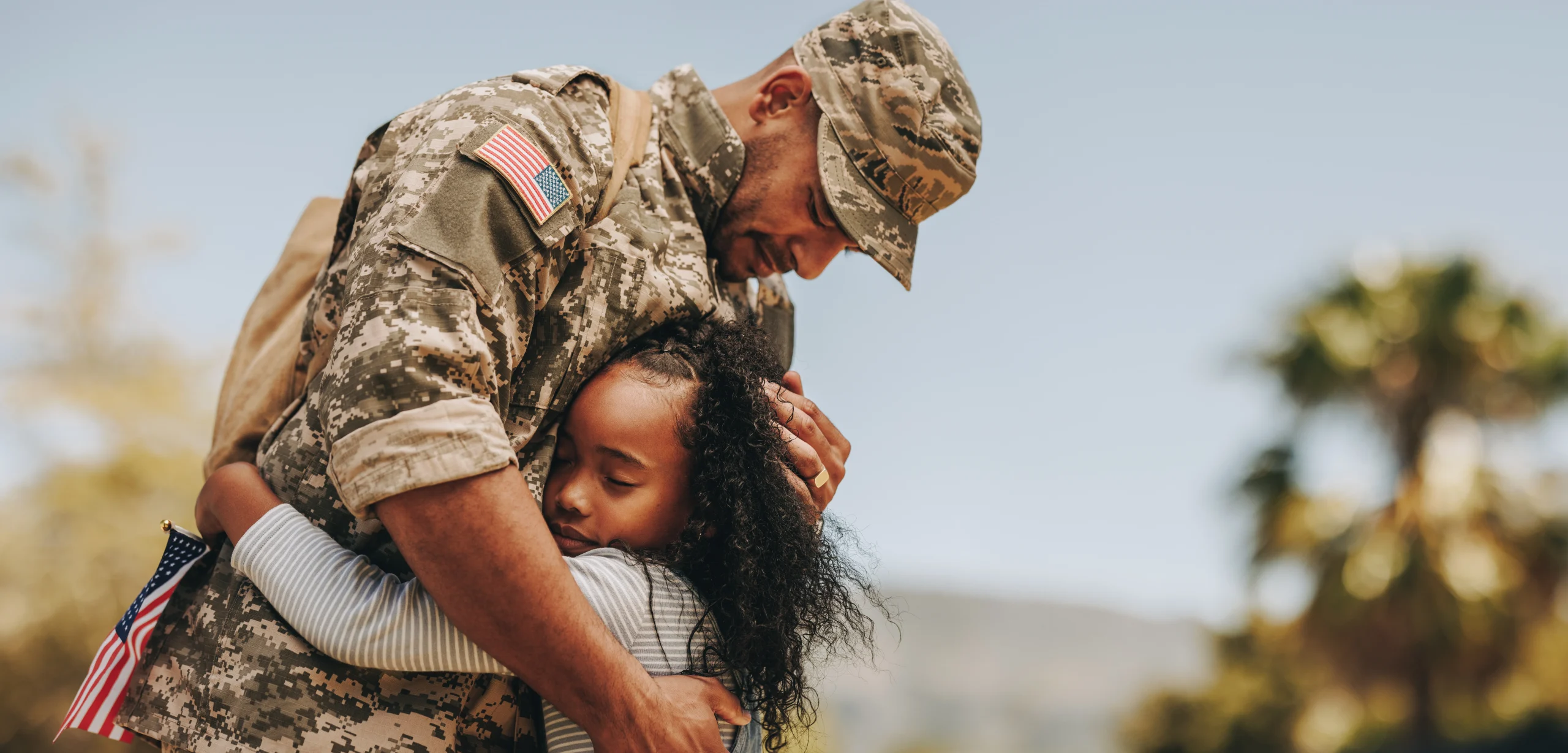 Military advertising concept with U.S. service members and patriotic branding imagery
